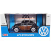 1966 Volkswagen Beetle Black with Wood Panels and Two Surfboards on Roof Rack 1/24 Diecast Model Car by Motormax