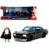 1971 Nissan Skyline GT-R RHD (Right Hand Drive) Black with Silver Stripe and Mikey Diecast Figure 